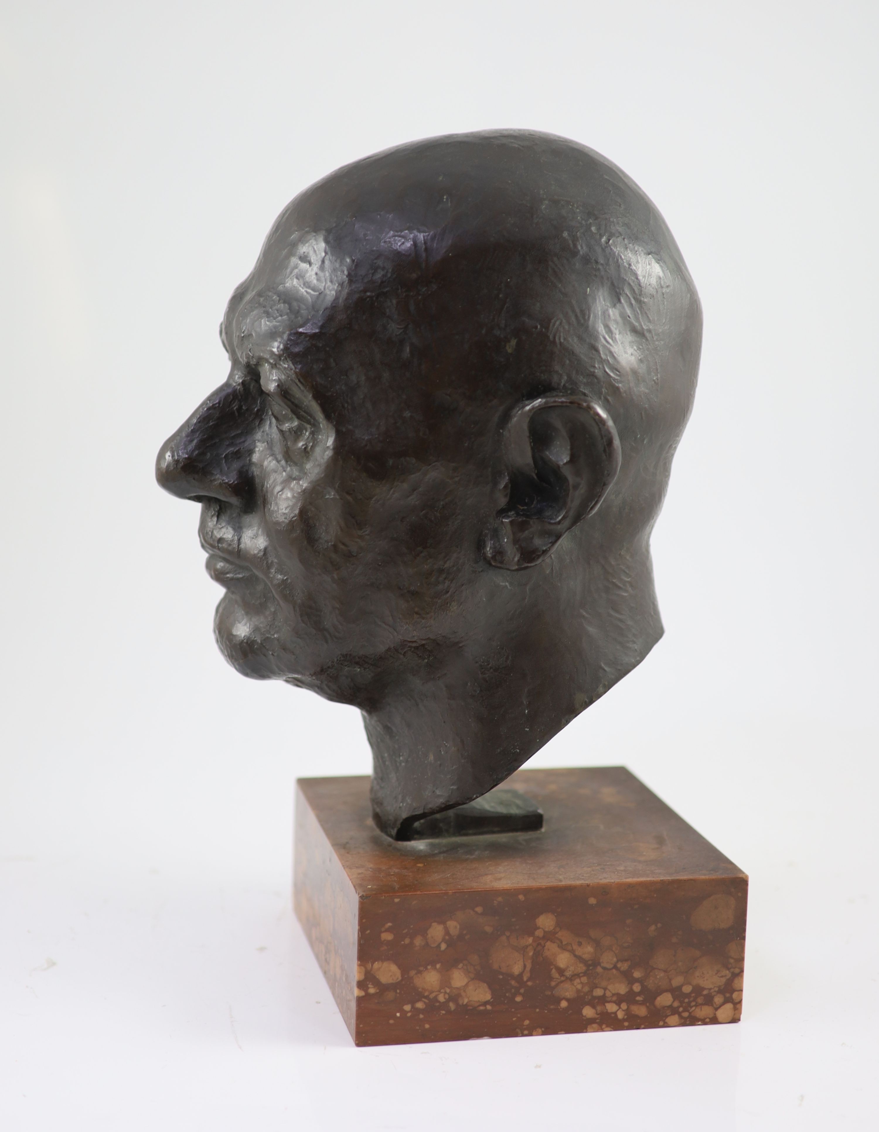 Turi Weinmann, (German, 1883-1950). A lifesize bronze head study, possibly a self-portrait of the artist, H 39cm overall.